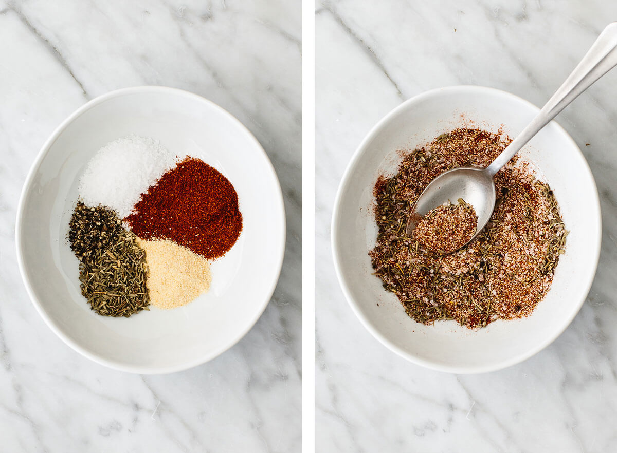 Mixing a spice blend in a bowl for baked chicken breasts.