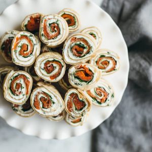 (gluten-free, paleo) Herbed Chevre, Spinach and Smoked Salmon Pinwheel. A tasty appetizer or snack made with cassava flour tortillas.