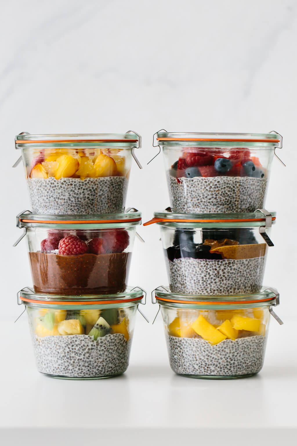 Chia pudding meal prepped into glass containers.