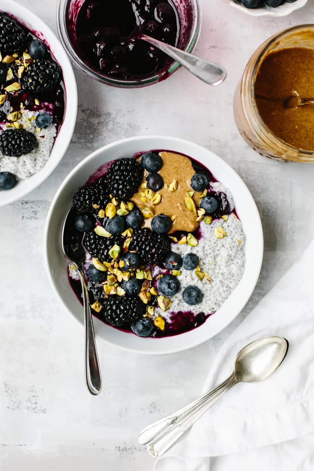 This peanut butter and jelly chia pudding (or almond butter and blueberry puree chia pudding) tastes just like a PB&J sandwich. It's a delicious, healthy breakfast recipe!