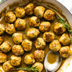 Saucy turkey meatballs in a large white pan