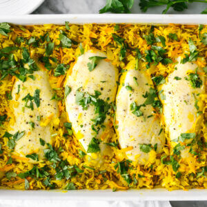 A dish filled a turmeric chicken and rice casserole